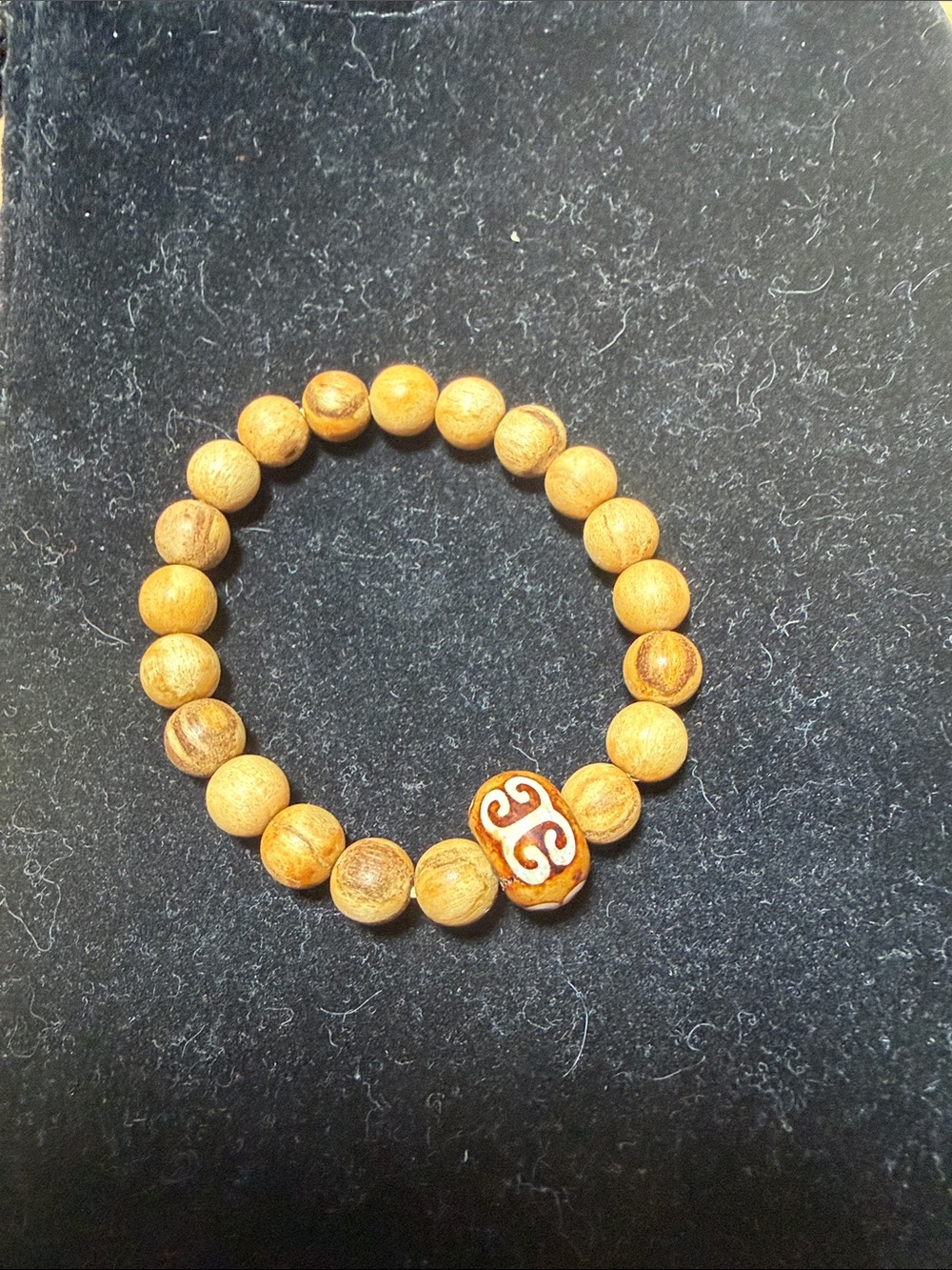 Natural Wood Bead Bracelet with Carved Accent - Brown